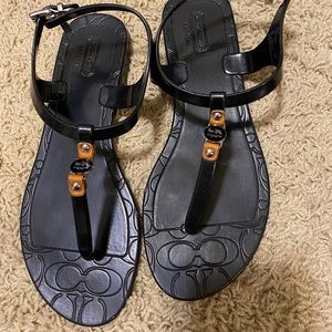 Coach black flat sandals